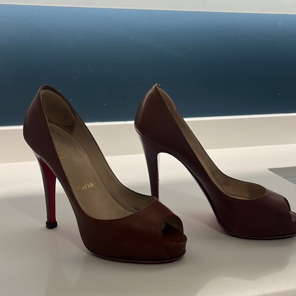 Authentic Christian Louboutain peep toe heels